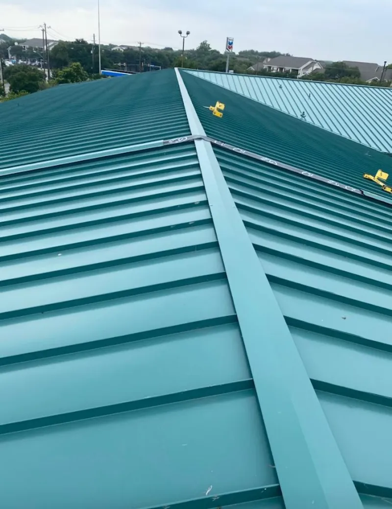 Green commercial metal roof ridge and valley for Metal Roof Repair in Clarkston Heights-Vineland