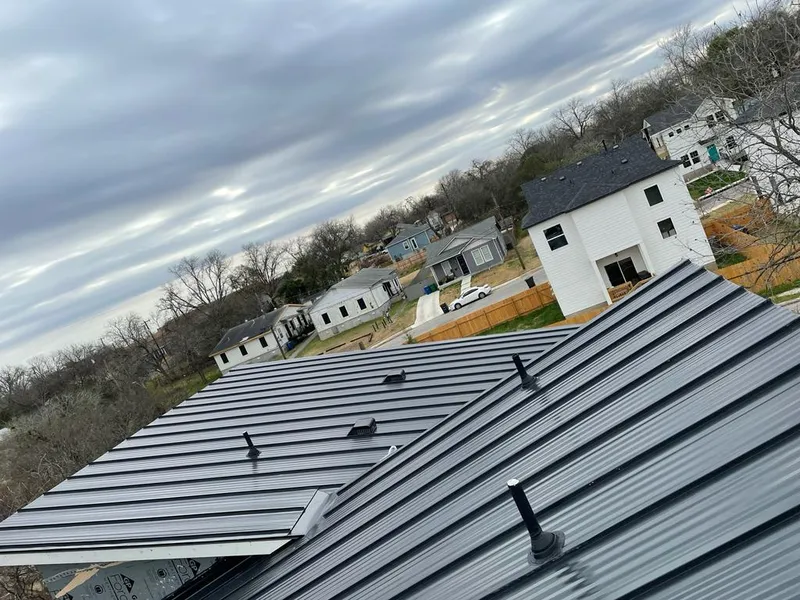 Standing seam metal roof panels with vents for Skylight Repair in Clarkston Heights-Vineland